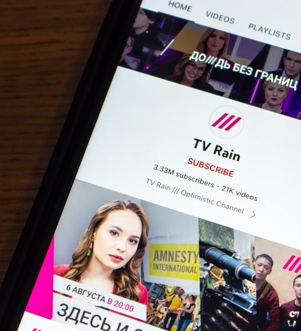 A phone screen depicting the Youtube channel of Russian-language independent television channel TV Rain, also known as Dozhd