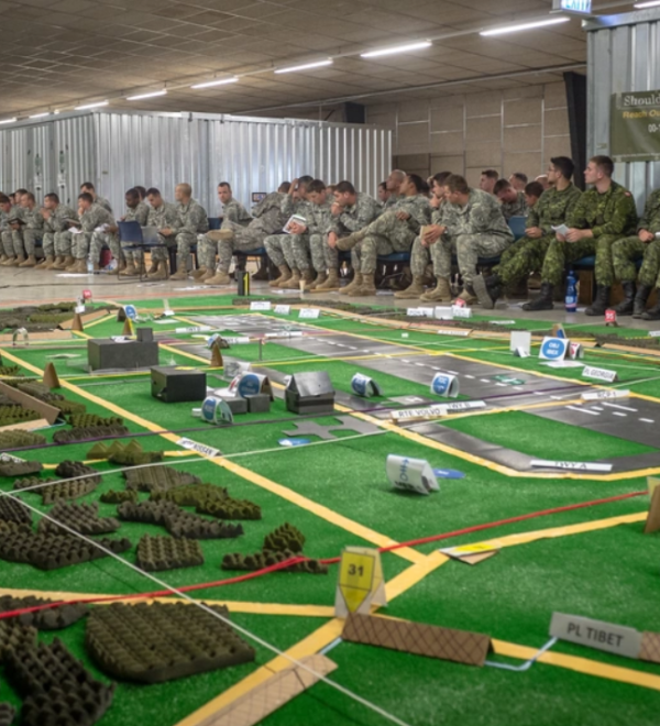 U.S. Army, Royal Canadian Regiment and Italian Esercito soldiers are briefed on the upcoming operations a part of Steadfast Javelin II on Rhein Ordnance Barracks, Germany, Sept. 3, 2014.