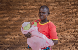 Joyce Makasi holding her baby